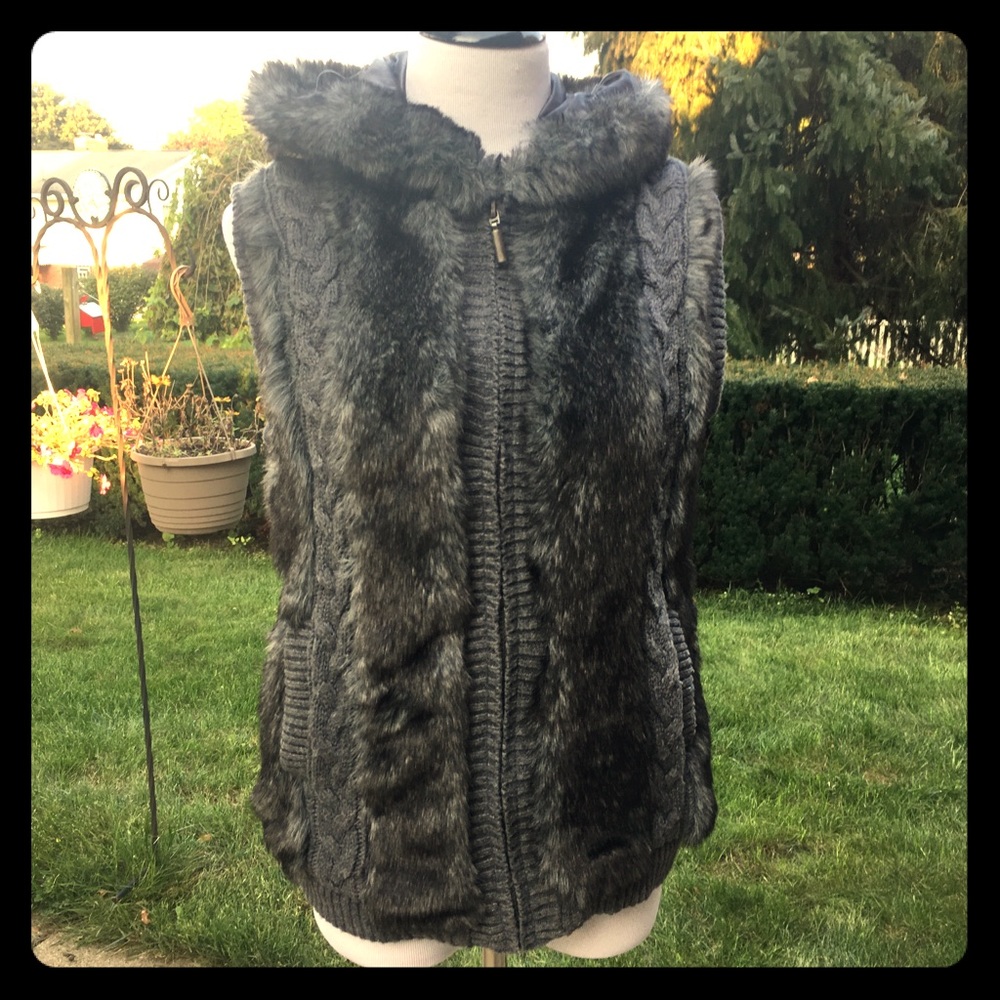 Faux fur vest with hood.